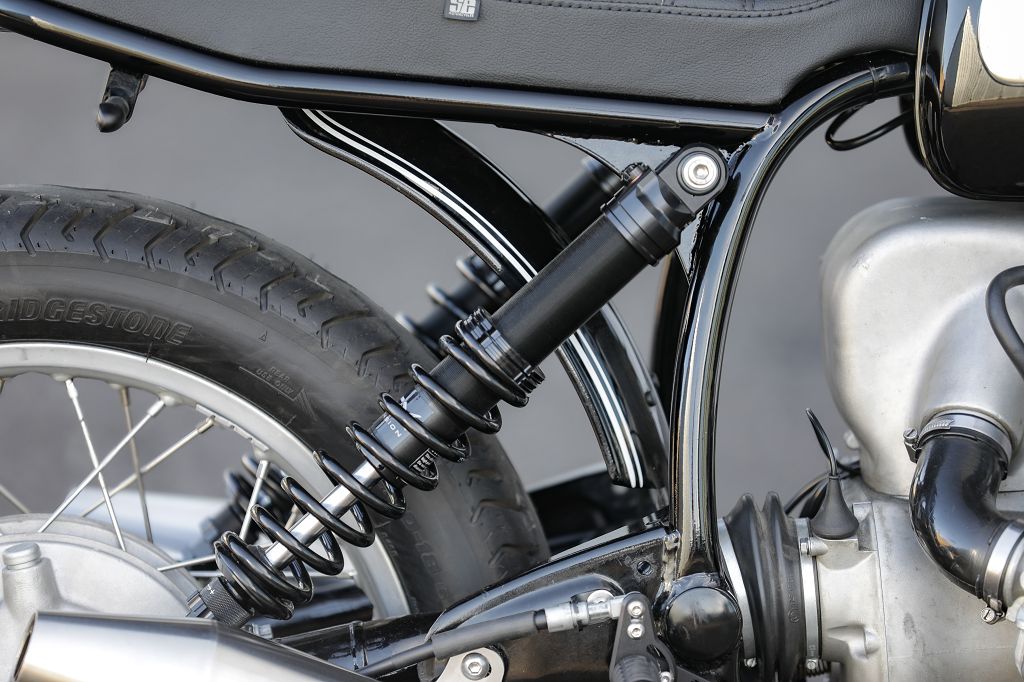 Close-up of the suspension and rear tire of the BMW Bobber SE Classic Racer motorcycle.
