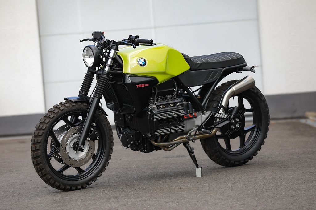 BMW K75 SE Scrambler concept bike showcased in vibrant yellow with modern design features.