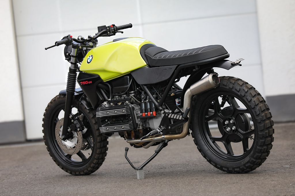 BMW K75 SE Scrambler concept bike in bright green and black color scheme with rugged tires and custom design.