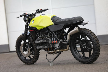 BMW K75 SE Scrambler concept bike in bright green and black color scheme with rugged tires and custom design.