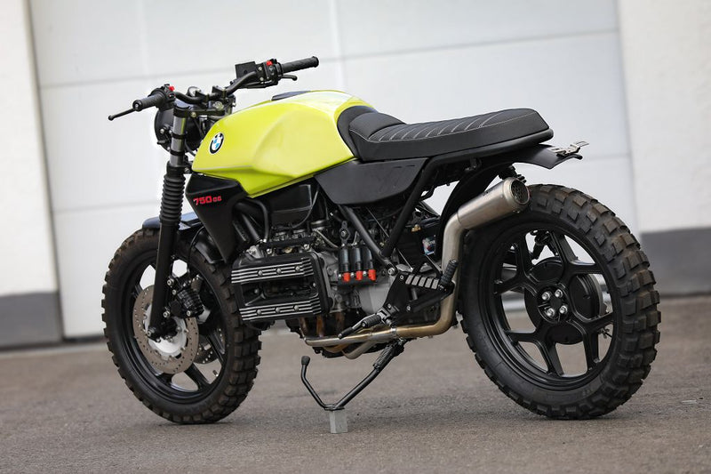 BMW K75 SE Scrambler concept bike in bright green and black color scheme with rugged tires and custom design.