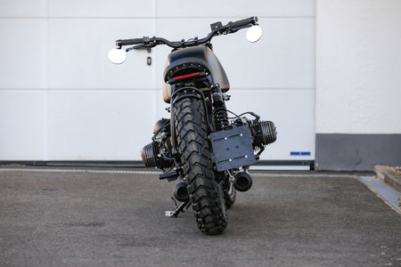 BMW Bobber SE custom bike showcasing a sleek design and powerful silhouette from a rear view.